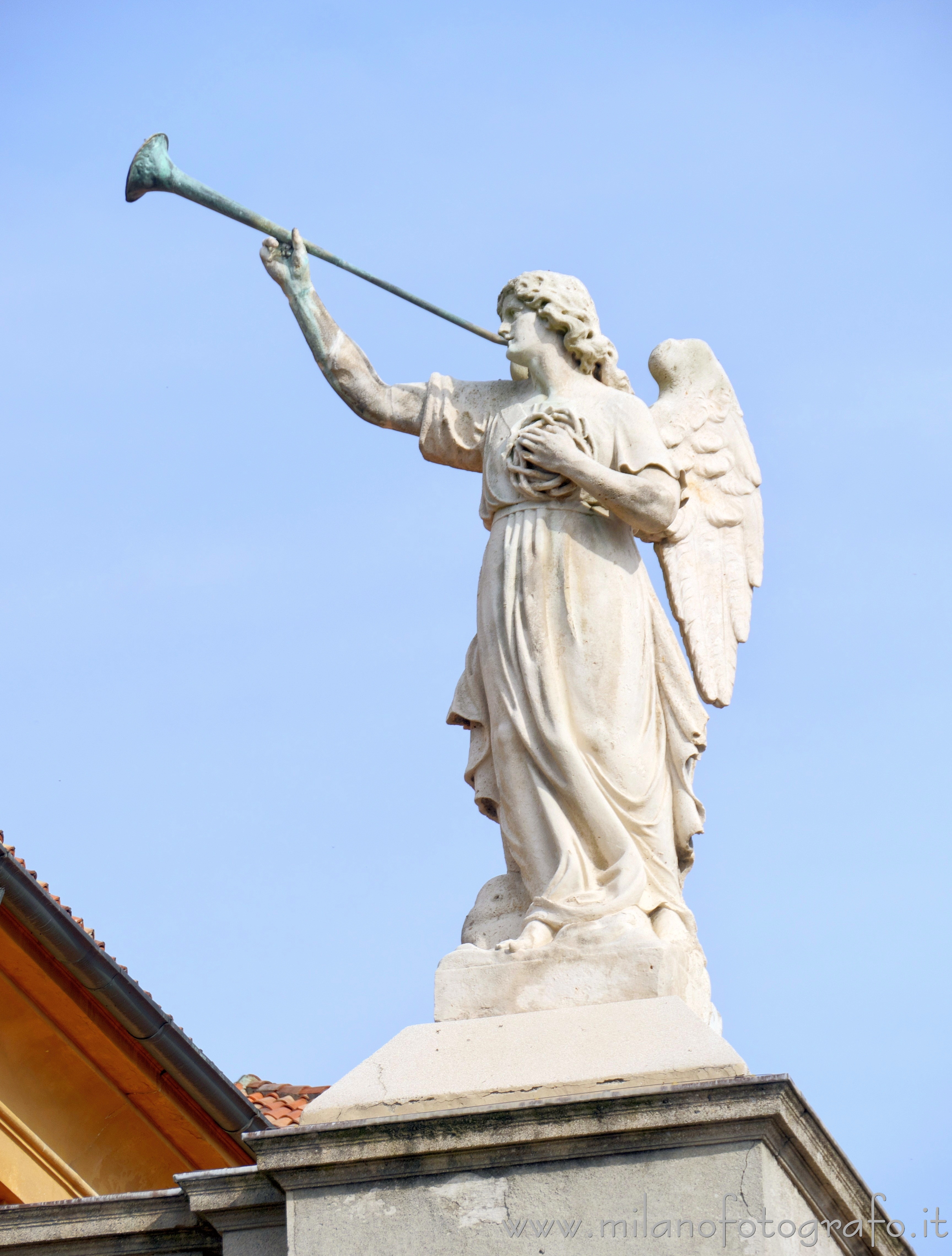 Vimercate (Monza e Brianza, Italy) - Statue of angel on the facade of the Sanctuary of the Blessed Virgin of the Rosary